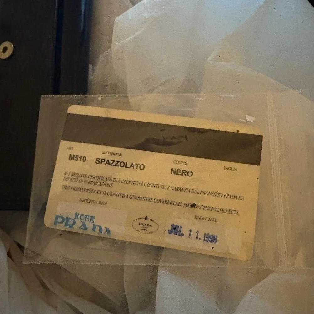 Prada Black Leather Wallet with‎ Minimalist Design